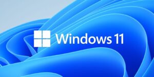 Windows 11 text and logo on a blue background